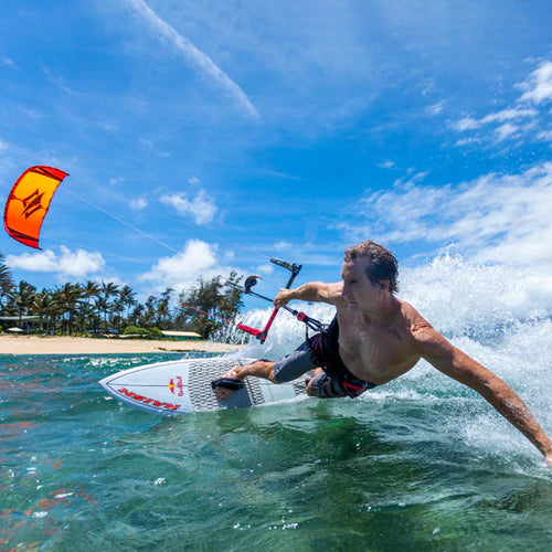 Kitesurfing with a Surfboard How and Why